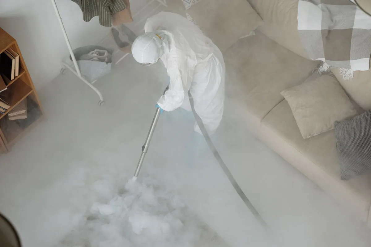 Biohazard cleanup technician in protective equipment, Springfield, VA